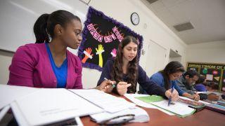 Students work in a professional writing course.